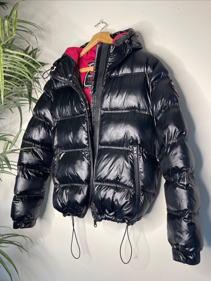 Front view of the actual glossy black PAJAR Canada puffer jacket