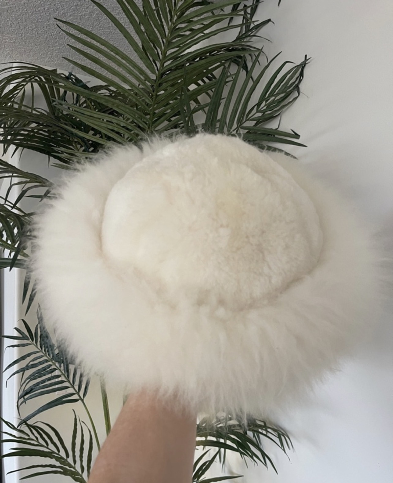 Cream genuine sheepskin fur hat from Rhea's personal collection